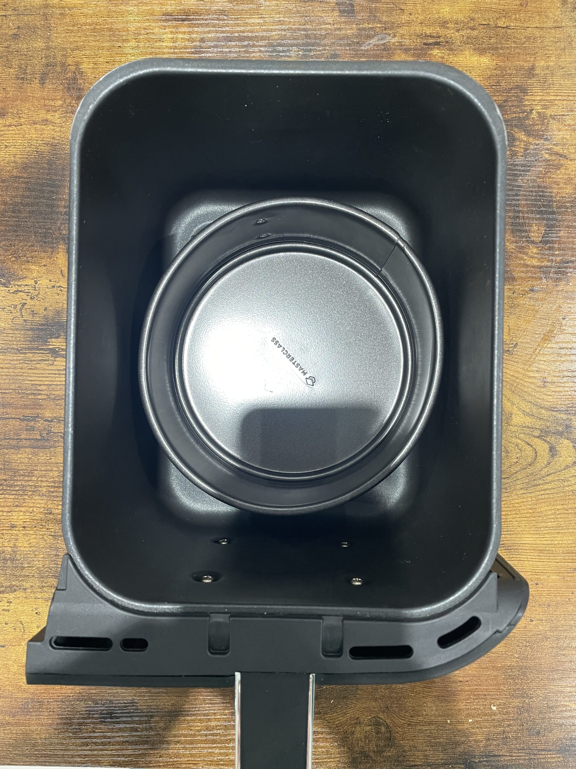 deep round cake tin in the drawer of the ninja foodi max air afryer
