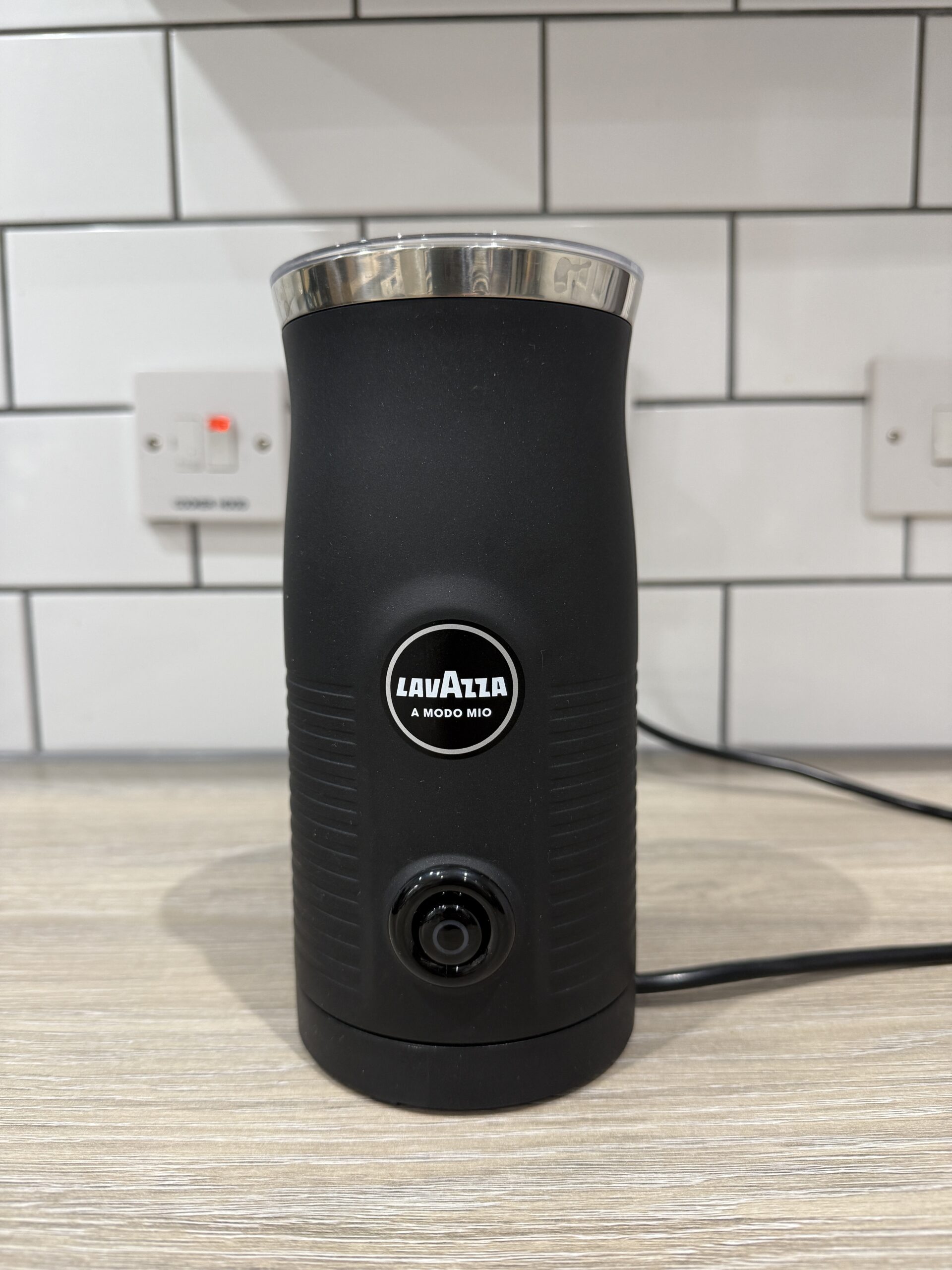 Lavazza milk frother on kitchen worktop